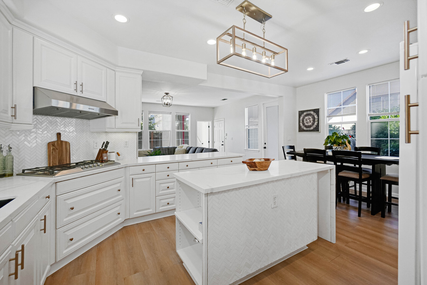 Wide view of the updated white kitchen
